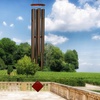 image:imageWoodstock Chimes Neptune Wind Chime for Outside 54 Large Silver Deep Tone Sound for Outdoor Garden Patio Porch Decor Encore Collection DCS54Chimes of Neptune  Bronze